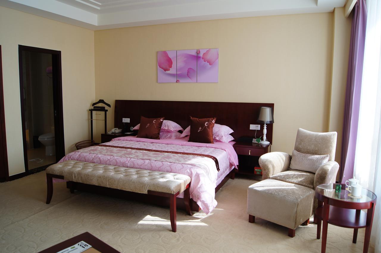 Fuxing Oriental Boutique Hotel Chifeng Room photo