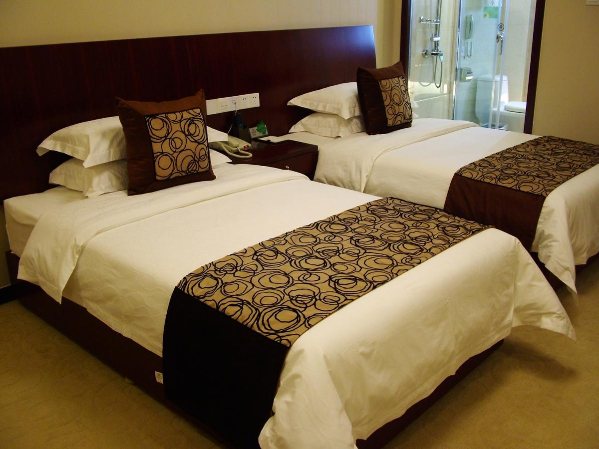 Fuxing Oriental Boutique Hotel Chifeng Room photo