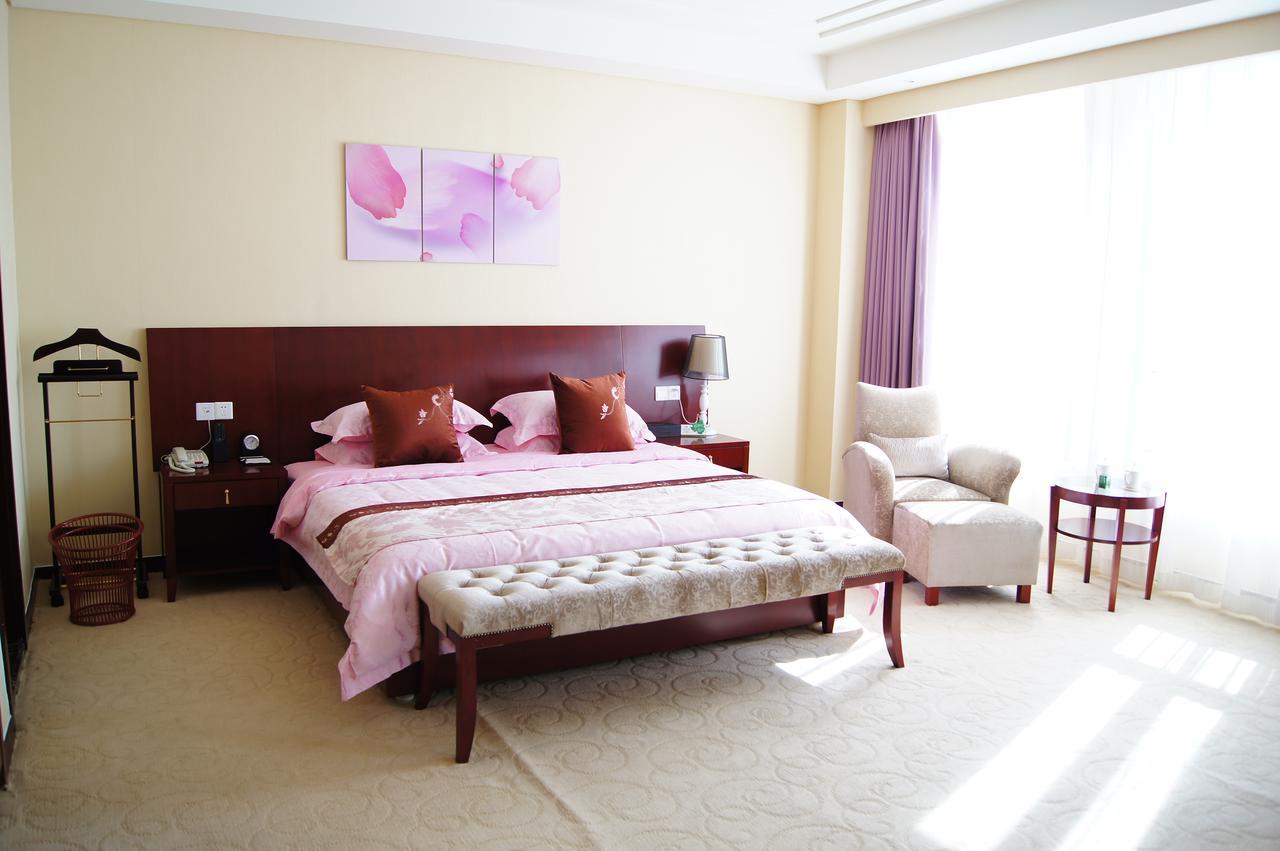 Fuxing Oriental Boutique Hotel Chifeng Room photo