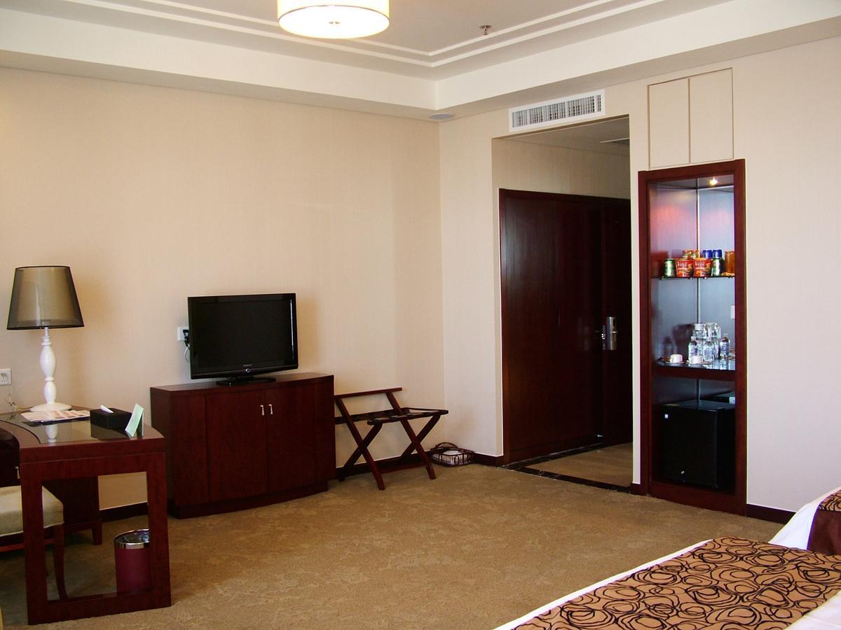 Fuxing Oriental Boutique Hotel Chifeng Room photo