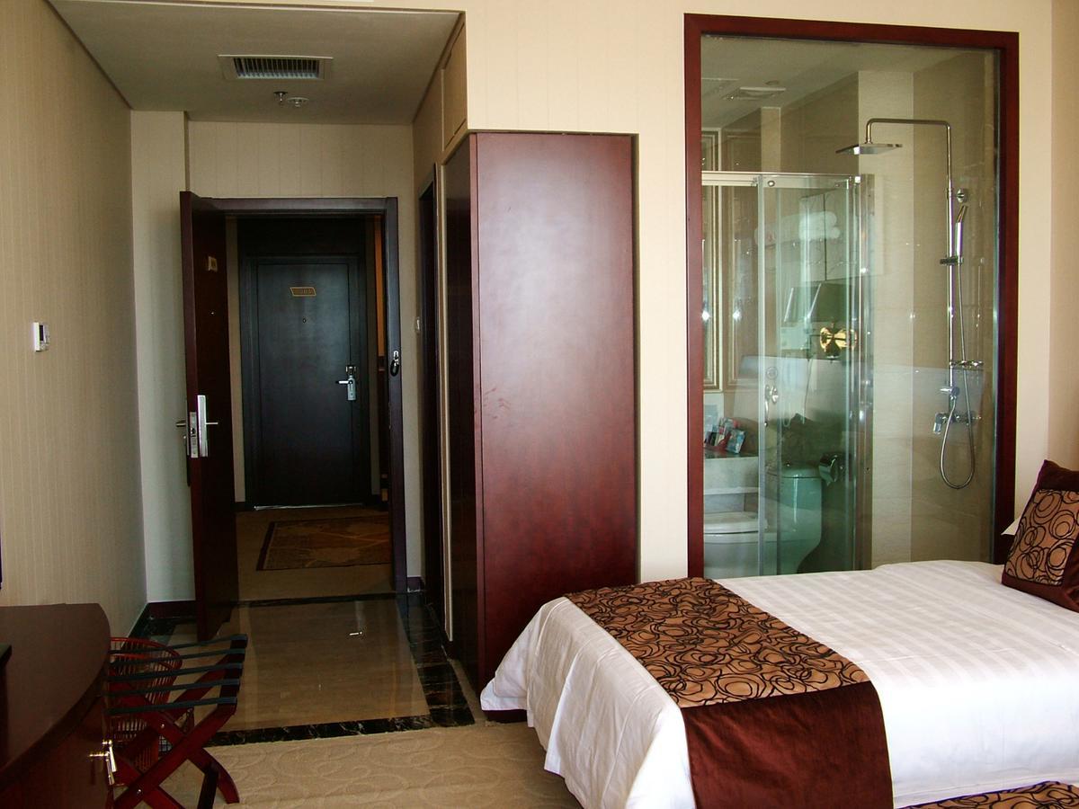 Fuxing Oriental Boutique Hotel Chifeng Room photo