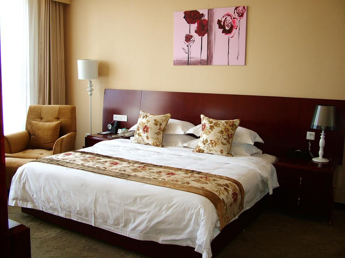 Fuxing Oriental Boutique Hotel Chifeng Room photo