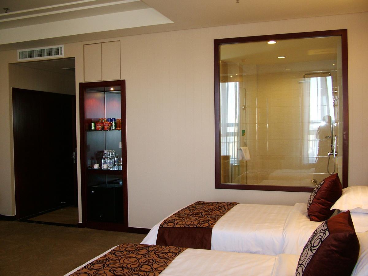 Fuxing Oriental Boutique Hotel Chifeng Room photo