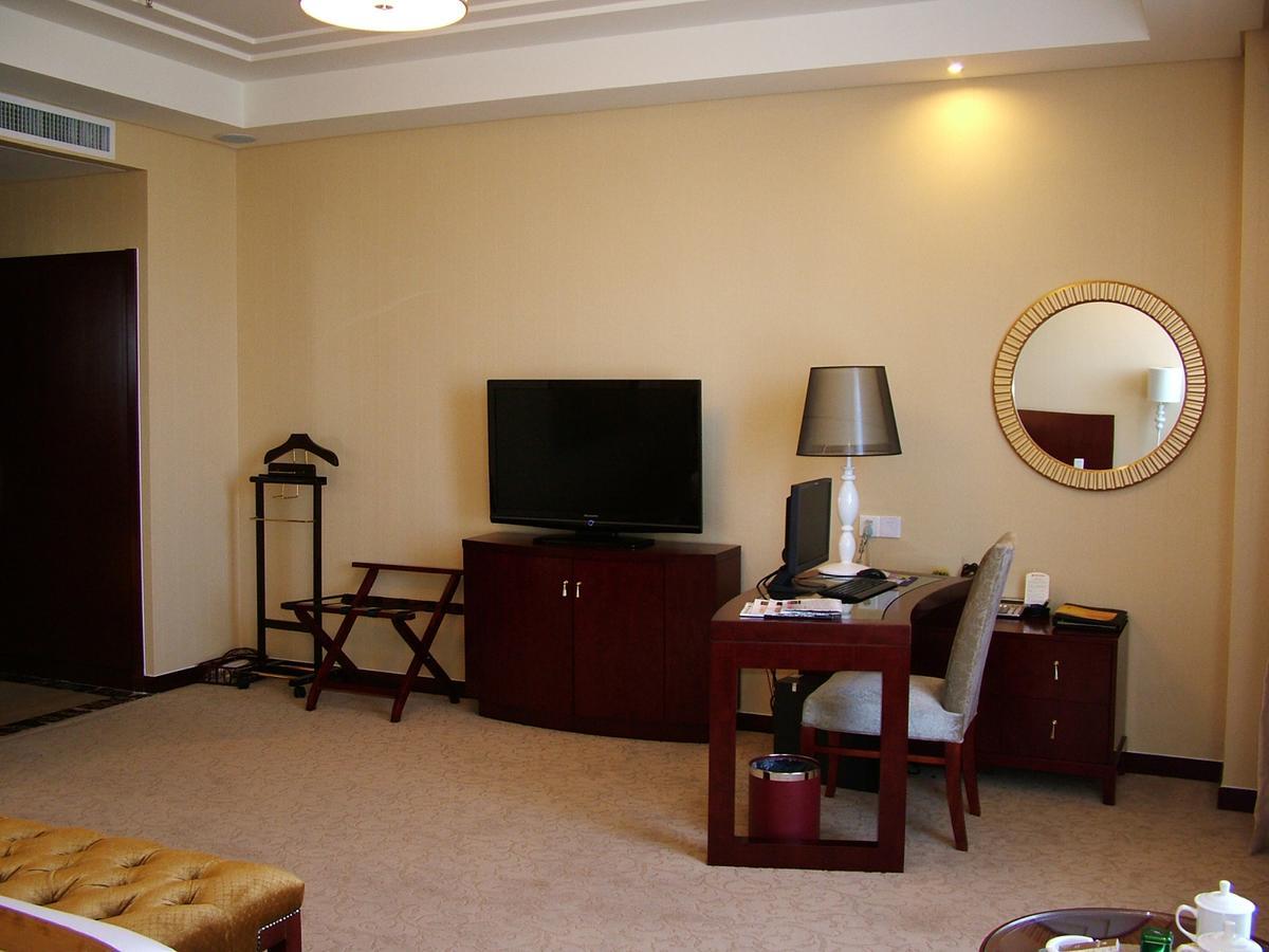 Fuxing Oriental Boutique Hotel Chifeng Room photo